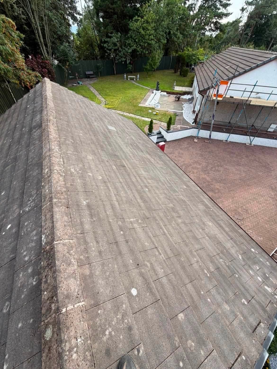 Cleaned tiled roof with the ridge and slopes free of moss