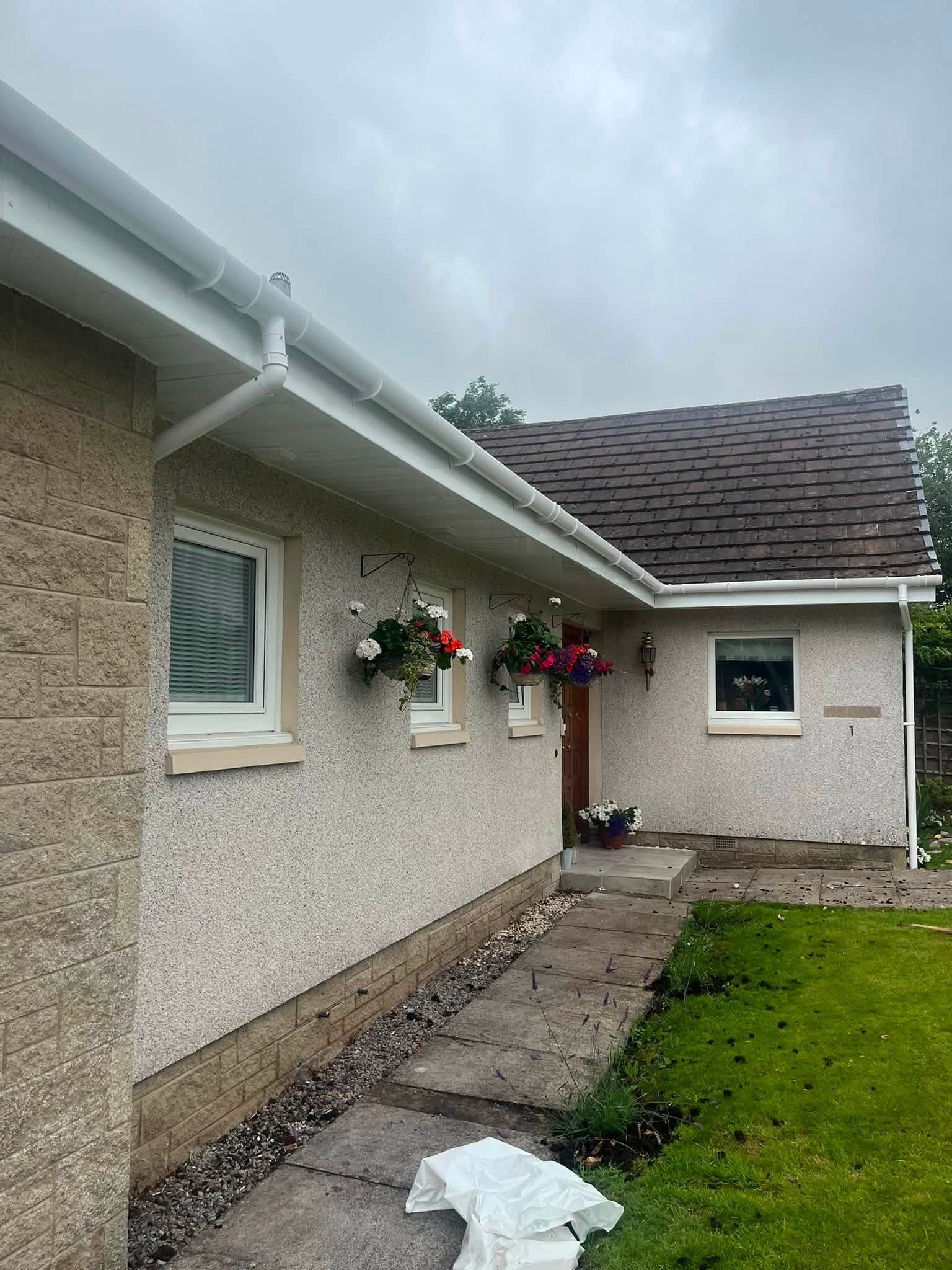 New white uPVC fascias and guttering fitted along the roofline
