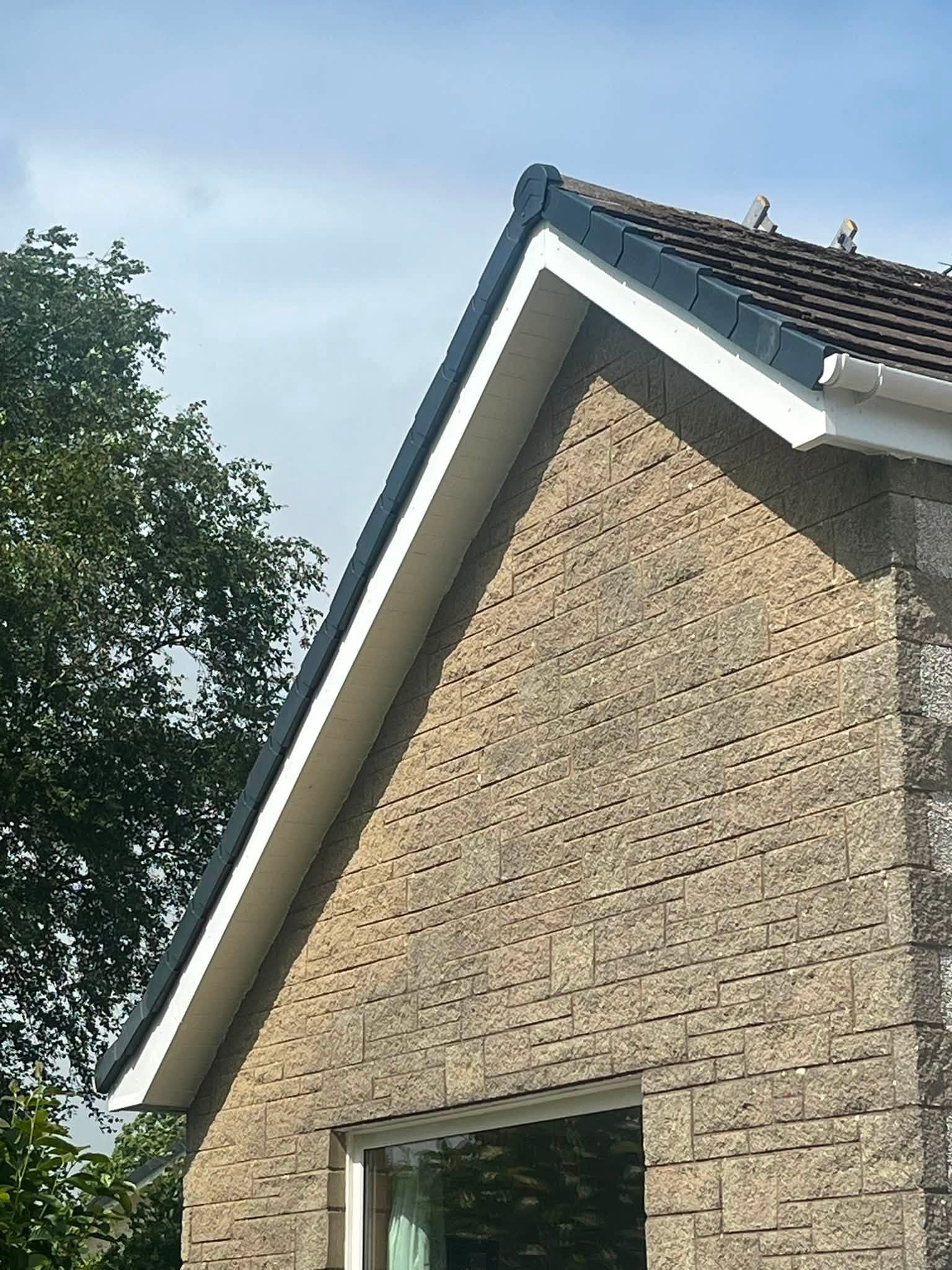 Hipped slate re-roof and rebuilt chimney by RML Roofing Services